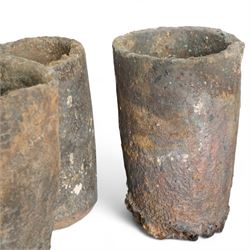Nine lava stone iron smelting crucible pots in various conditions