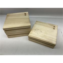 Three Chinese polychrome enamel plates each decorated with floral decoration, all marked beneath, D21cm 