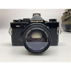 Olympus OM 2 camera body, serial no 112410 with 'Olympus OM-System Zuiko Auto-S 50mm 1:1.8' lens, together with 'Vivitar 28mm 1:2.0 MC close focus wide angle' lens and other camera equipment 