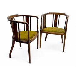 Pair of early 20th century Edwardian inlaid mahogany elbow chairs, shaped top rails with central diamond motif and line inlays, flanked by turned uprights, green velvet seats, on square tapered legs