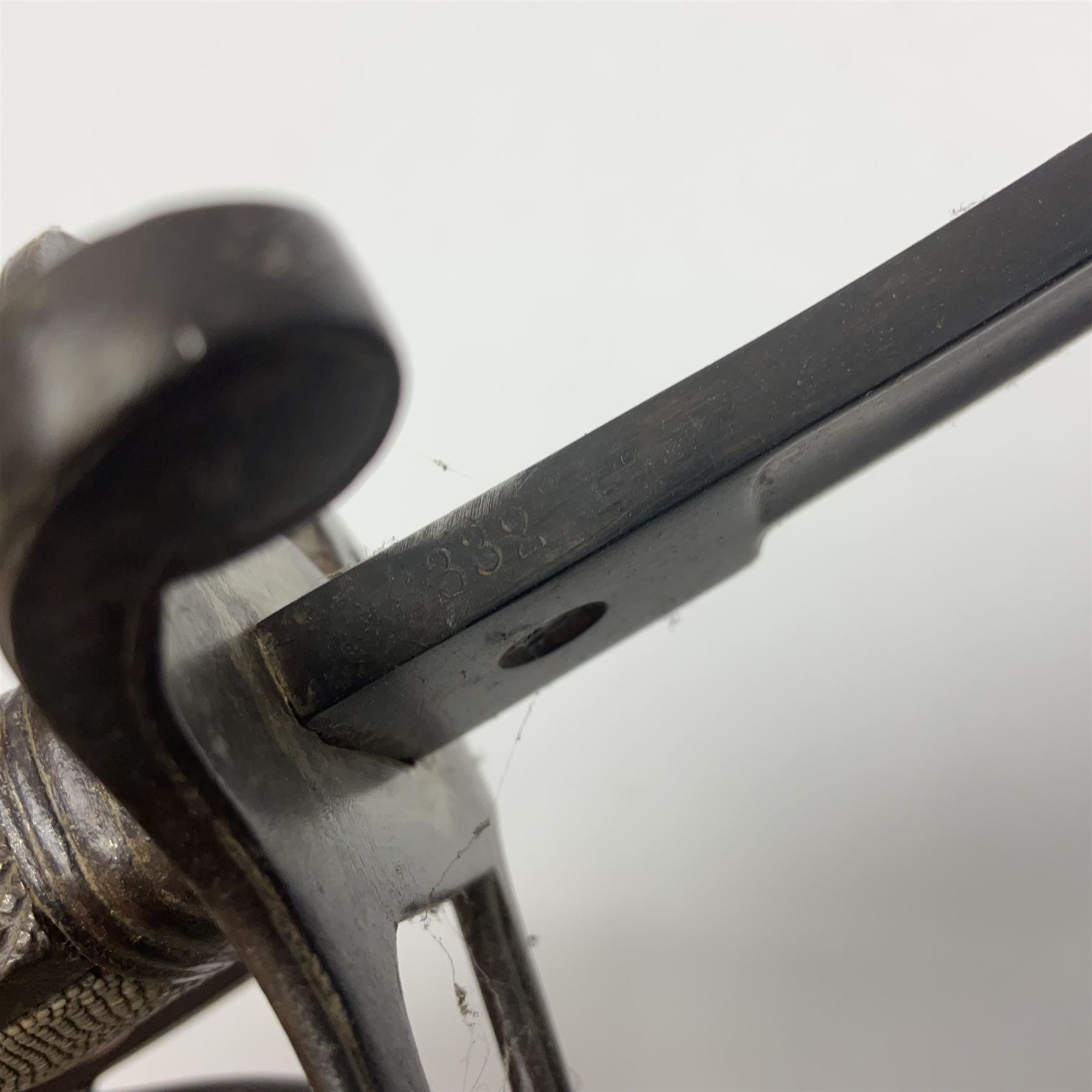 WW1 British Army 1897 Pattern Officers Sword, the 80cm fullered steel blade with traces of decoration and inscribed 'W.E. French 1914'; the basket hilt pierced with the George V cypher and wire-bound fish-skin grip L97cm overall; and WW1 British 1821 pattern Royal Artillery officer's sword with three-bar hilt; both lacking scabbard (2)