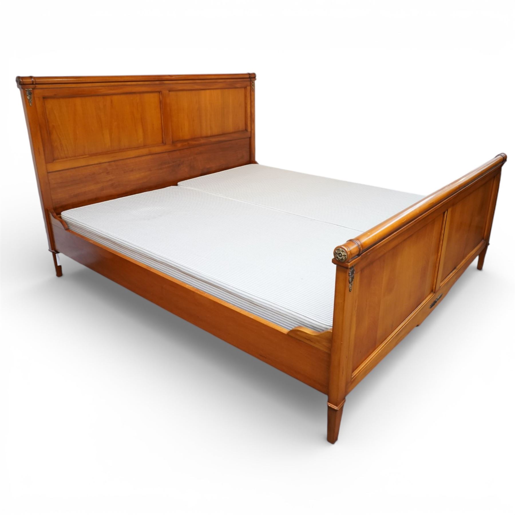 And So To Bed - 6ft super king cherry wood sleigh bed, with turned rails above a panelled head and footboard, with applied brass flowers and foliate mounts, raised on square tapering supports