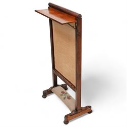 Early to mid-19th century rosewood fire screen, lift-up needle work panel decorated with stylise floral pattern, moulded frame on platforms, lobe carved bun feet