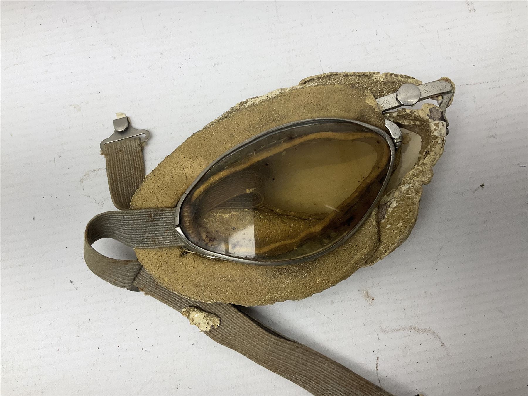 British Army Sam Brown leather belt with Turkish markings; New Zealand Land Forces officer's commission certificate dated 1919; WWII small pair of trench art brass helmet shaped scuttles; and other items