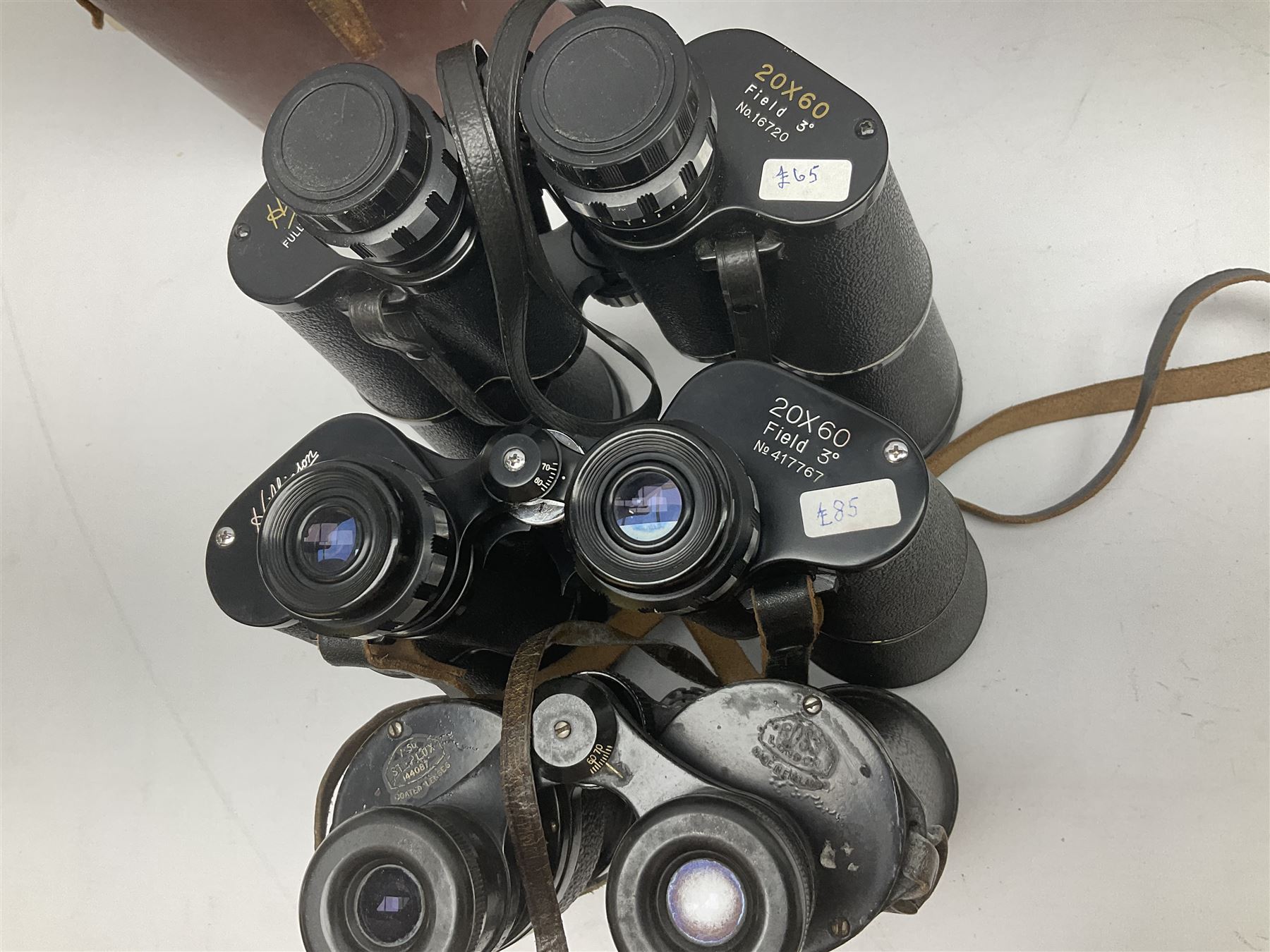 Ten cased pairs of binoculars, to include Ross London Steplux 7x50, Ross Solaross 16x60, Crescent zoom 7x- 12x50, Hilkinson 20x60,  Ross Stepnada 7x30,  Philo 10x50 etc