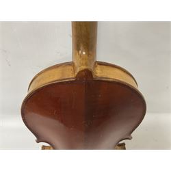 Copy of a full size Stradivarius violin, with an ebonised fingerboard, tailpiece and tuning pegs Length 60cm