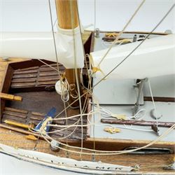 Scratch built model yacht 'Rue de la mer', with painted blue and white hull, with acrylic case, model H67.5cm