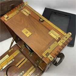 Sanderson Koilos folding plate camera in mahogany and lacquered brass, with 'Ensign Anastigmat Series IV No 2' lens, serial no 173998, with original leather case