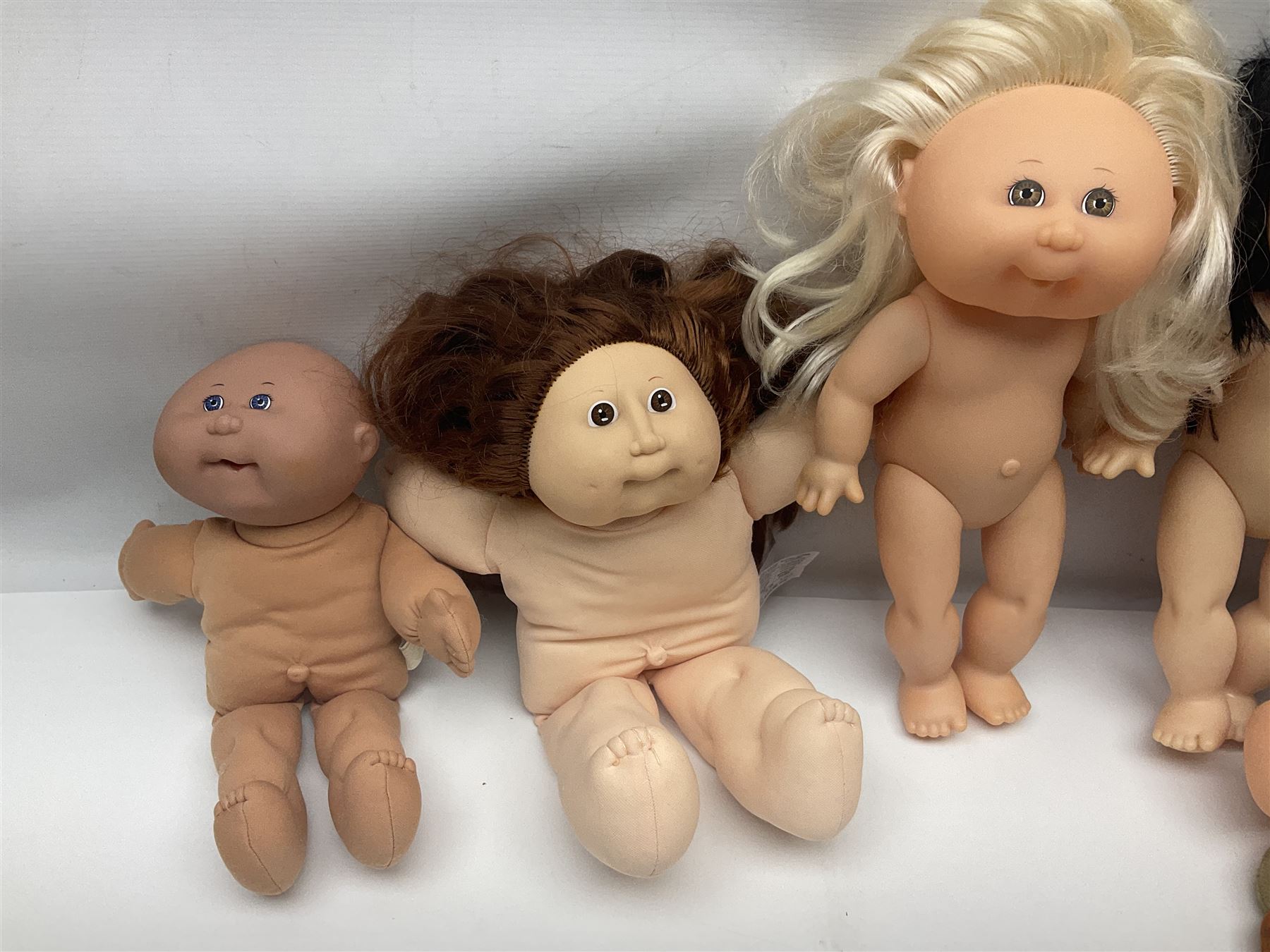 Plush covered soft toy of a swimming duck with squeeze type musical action L17cm; and collection of ten Cabbage Patch type dolls by various makers including Mattel, Hasbro, Appalachian Artworks, Migliorati etc