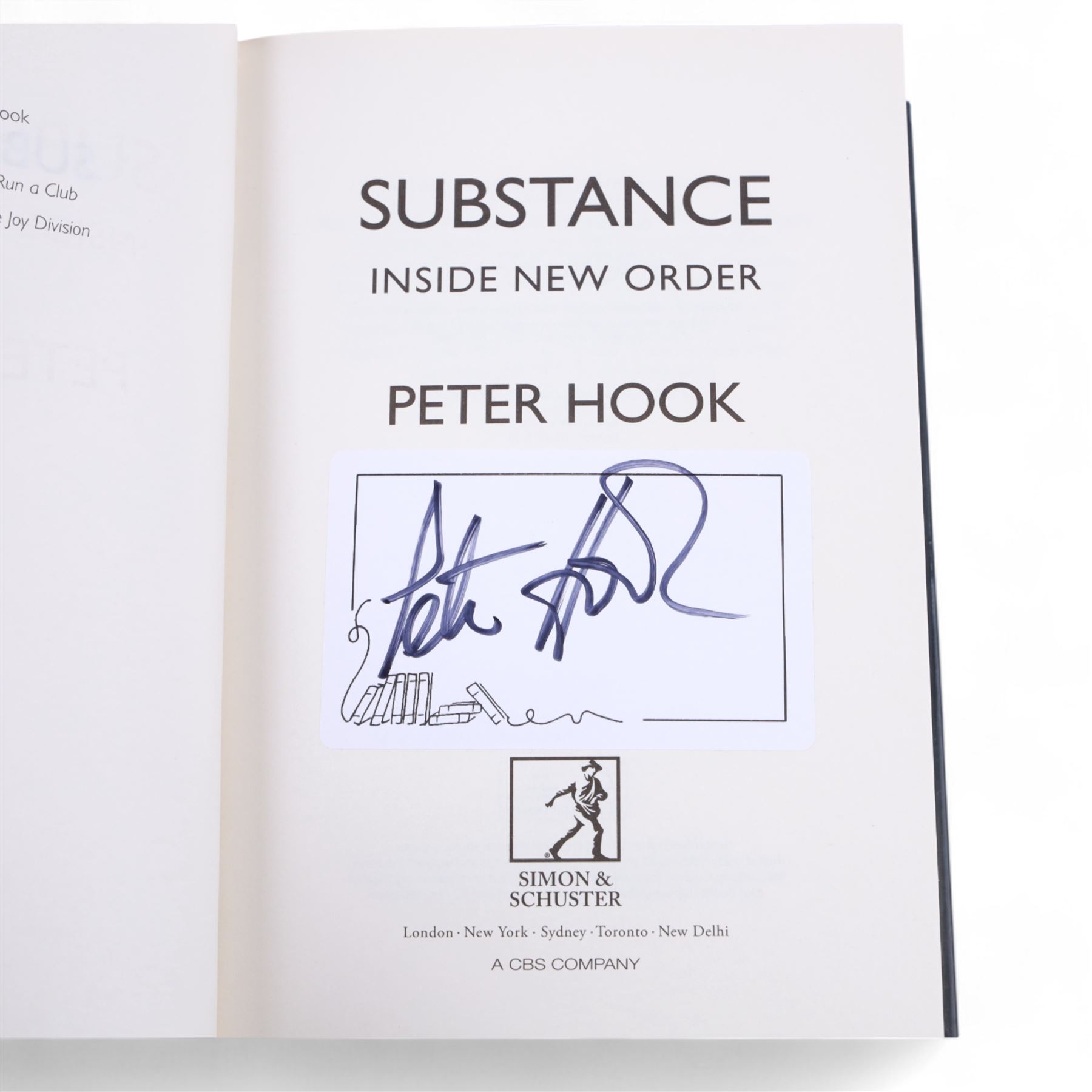 Joy Division/New Order framed album inserts and CDs, both signed by Peter Hook, together with three signed Peter Hook books 'Unknown Pleasures', 'Substance' and 'The Hacienda' and two The Hacienda t-shirts, frame H33cm