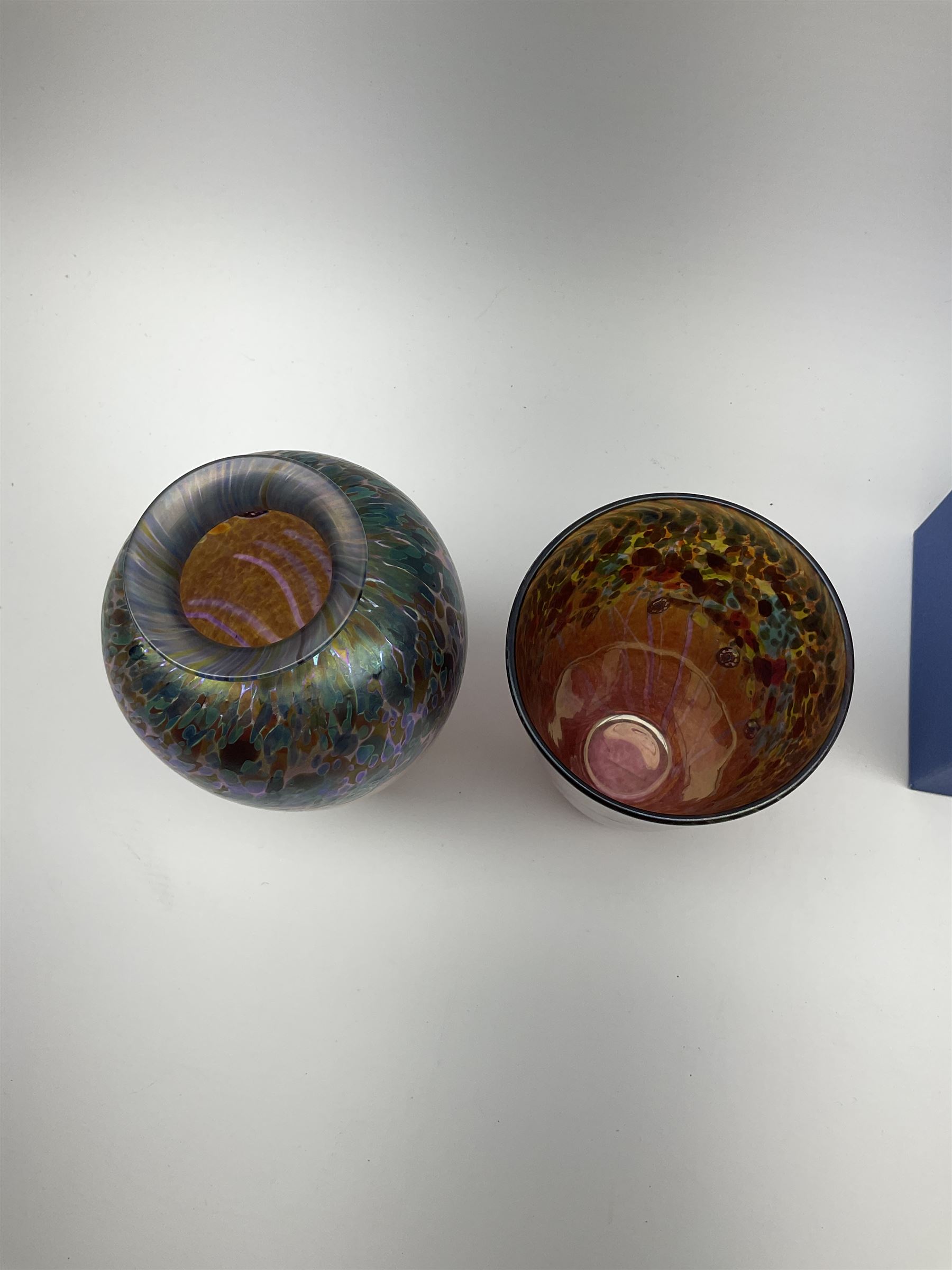 Two Art Glass Jonathan Harris vases, The first example of a baluster form, the second example of tapering cylindrical form,  each with iridescent decoration in tones of purple and blue, tallest example H18.5cm, each with makers box, together with a Isle of Wight glass paperweight. 
