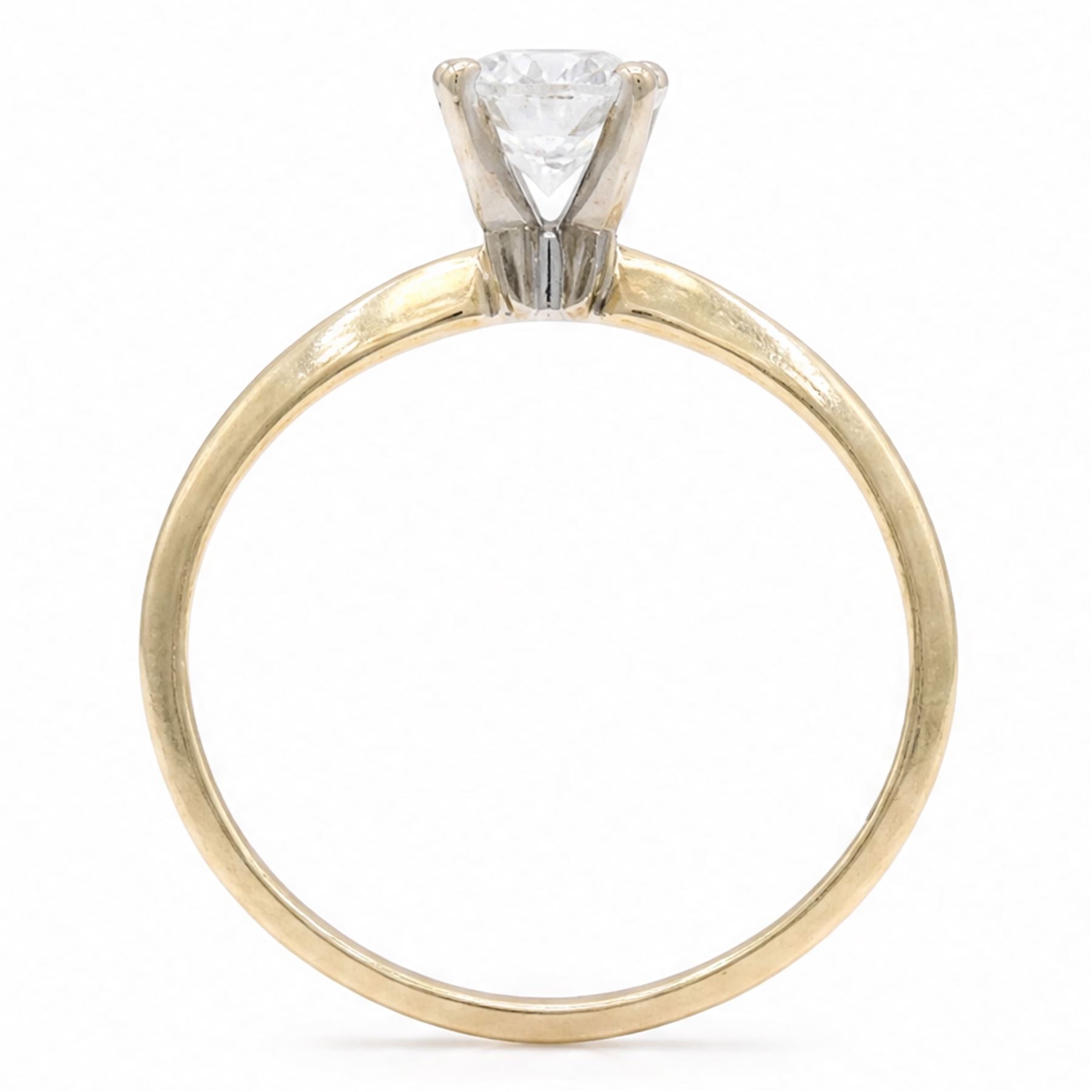 14ct gold diamond ring, four claw set with a single round brilliant cut diamond of 0.61 carat, stamped