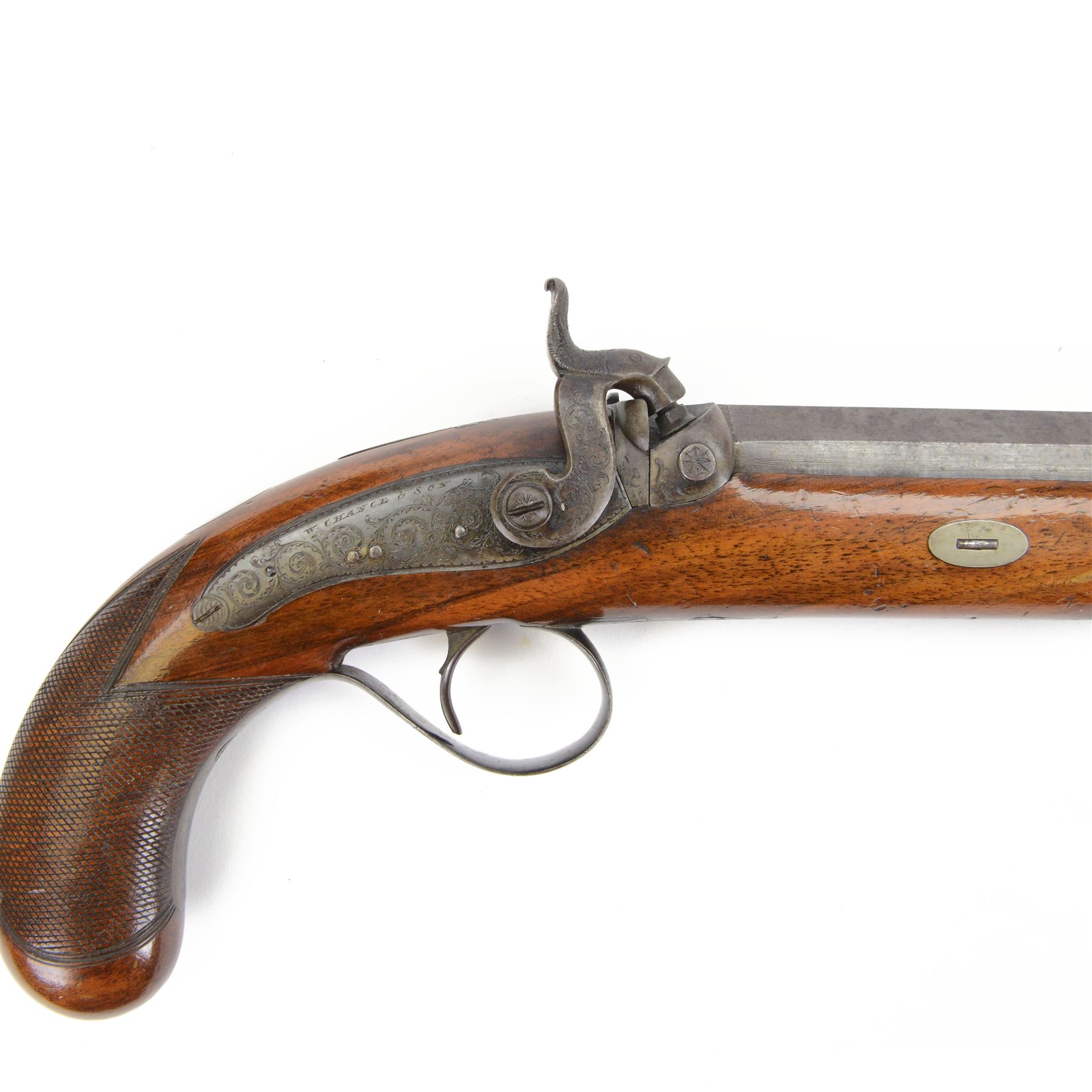 Pair of 19th century officer's duelling pistols, by William Chance & Son, with 25 bore sighted octagonal brown barrels, engraved London to the top, with gilt and platinum lines, foliate engraved tang, the back action lock plate signed and engraved with foliage, the walnut half stock, the trigger guard engraved with foliate and pineapple design, with ebony ramrods, in a brown velvet lined mahogany case, fitted with accessories including a copper pistol flask, a steel bullet mould, a tin of caps, lead balls, a cleaning rod with brass screw top