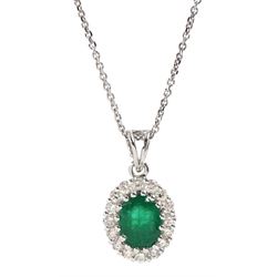 18ct white gold oval emerald and round brilliant cut diamond cluster pendant, stamped 18K, on a silver chain, emerald approx 1.10 carat, total diamond weight approx 0.45 carat