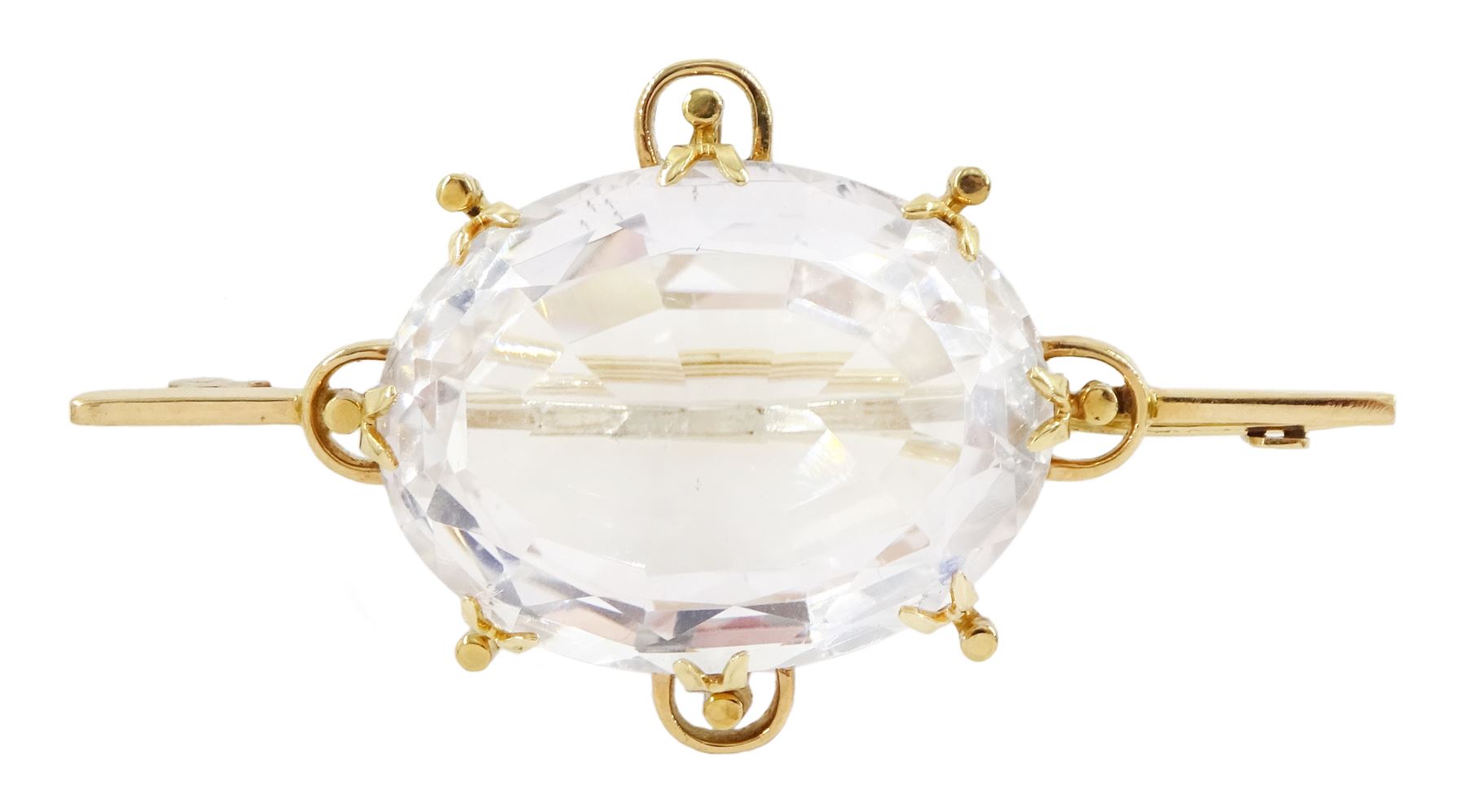 Early 20th century gold single stone oval rock crystal brooch, stamped 18ct