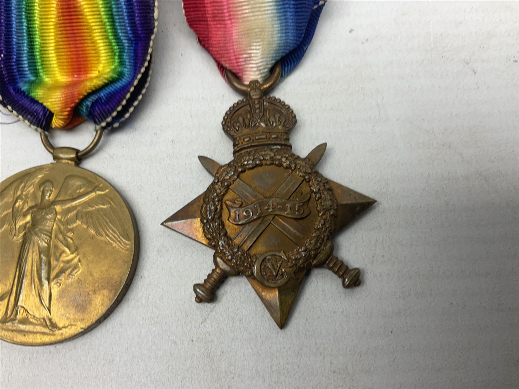 Family group of five WW1 medals for the East Yorkshire regiment comprising trio of 1914-15 Star, British War Medal and Victory medal awarded to 13-368 Pte. C. Padget; and British War Medal and Victory Medal to 201829 Pte. H.W. Padget; all with ribbons (5)