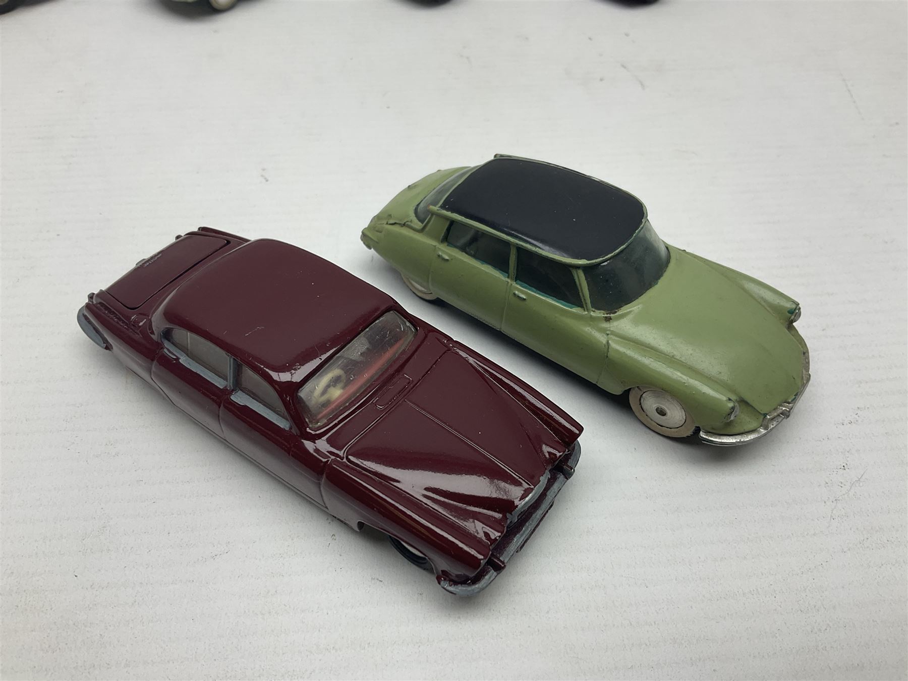 Eleven unboxed and playworn early die-cast models including Dinky Packard, Buick, two Jaguar Mark X and estate wagon, Corgi Mercedes-Benz 300S.L. Roadster, Ford Thunderbird, Citroen DS19 and Bentley Continental Sports Saloon, Spot-On Armstrong Siddeley Sapphire etc; all unboxed (11)