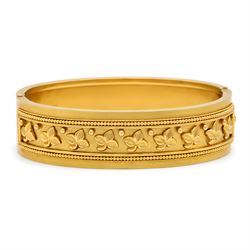 19th / early 20th century gold hinged bangle, with applied ivy leaf, bead and wirework decoration