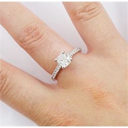 18ct white gold diamond ring, set with a single cushion cut diamond of 1.01 carat, with round brilliant cut diamond shoulders, hallmarked, with International Gemological Institute Report