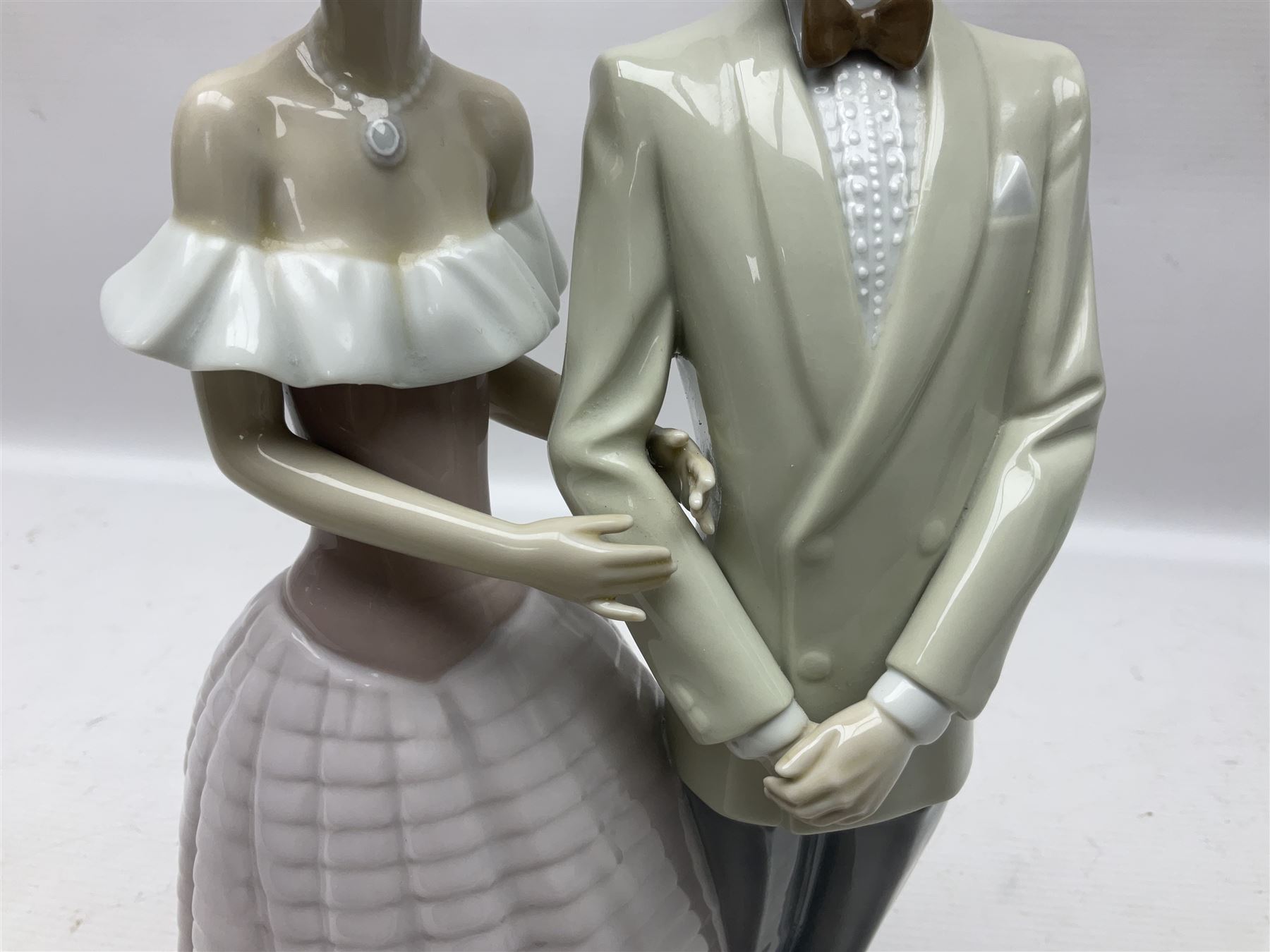 Lladro figure, An Evening Out, modelled as a man and women in evening dress, no 5540, year issued 1988, year retired 1991, H32cm