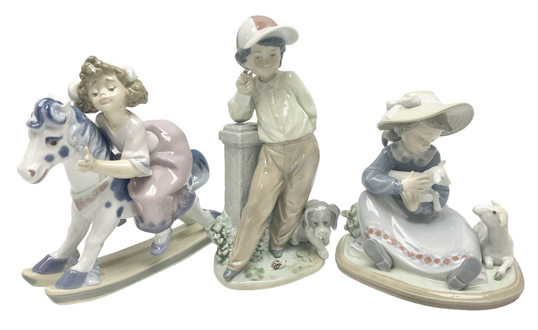 Three Lladro figures, Faithful Steed no 5769, Best Foot Forward no 5738 and Lambkins no 5469, all with original boxes, largest example H21cm 