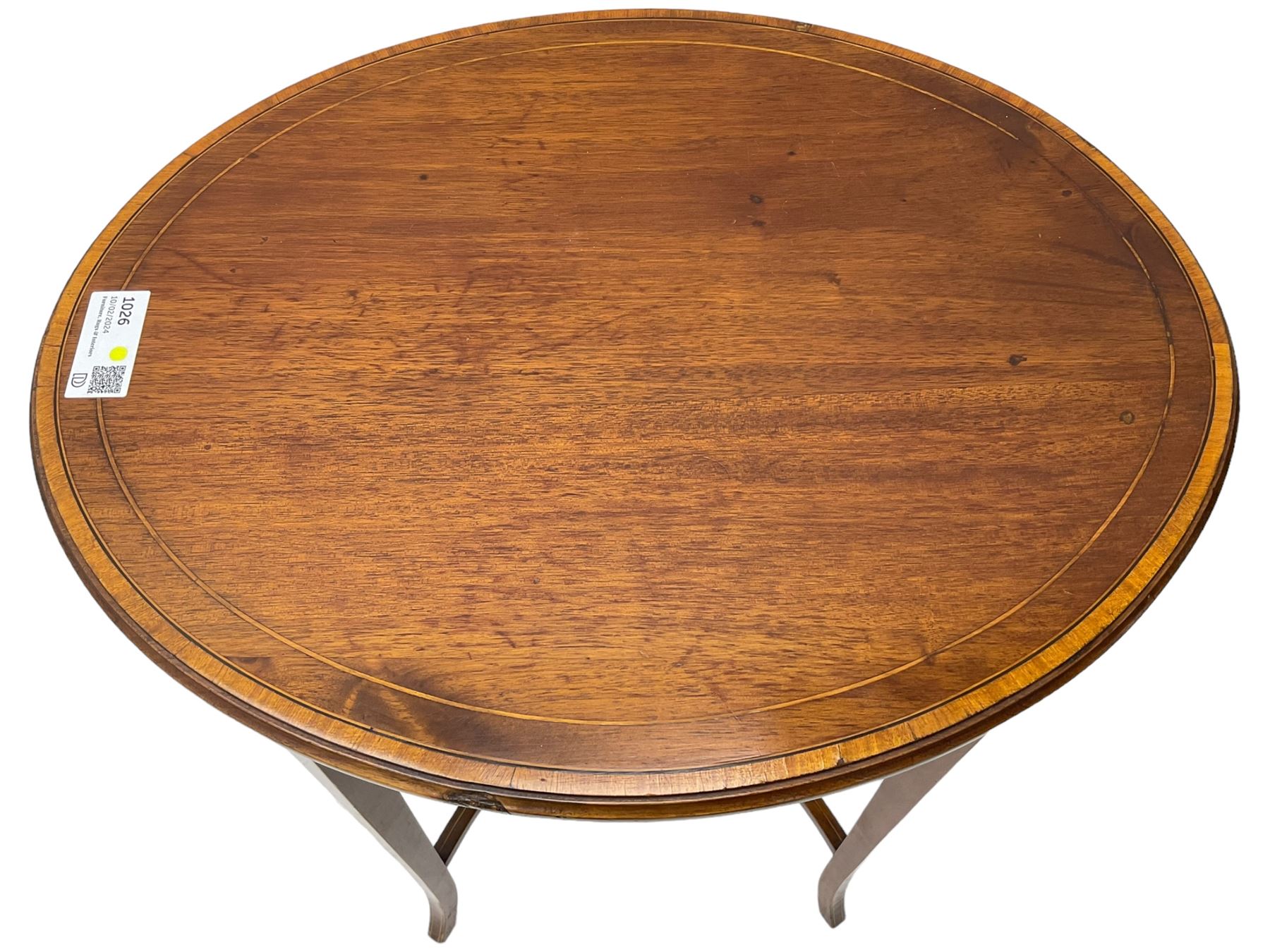 Edwardian inlaid mahogany centre table, oval moulded top with satinwood banding, on square tapering supports united by curved X-framed stretchers 