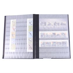 Queen Elizabeth II mint decimal stamps in one folder, face value of usable postage approximately 650 GBP