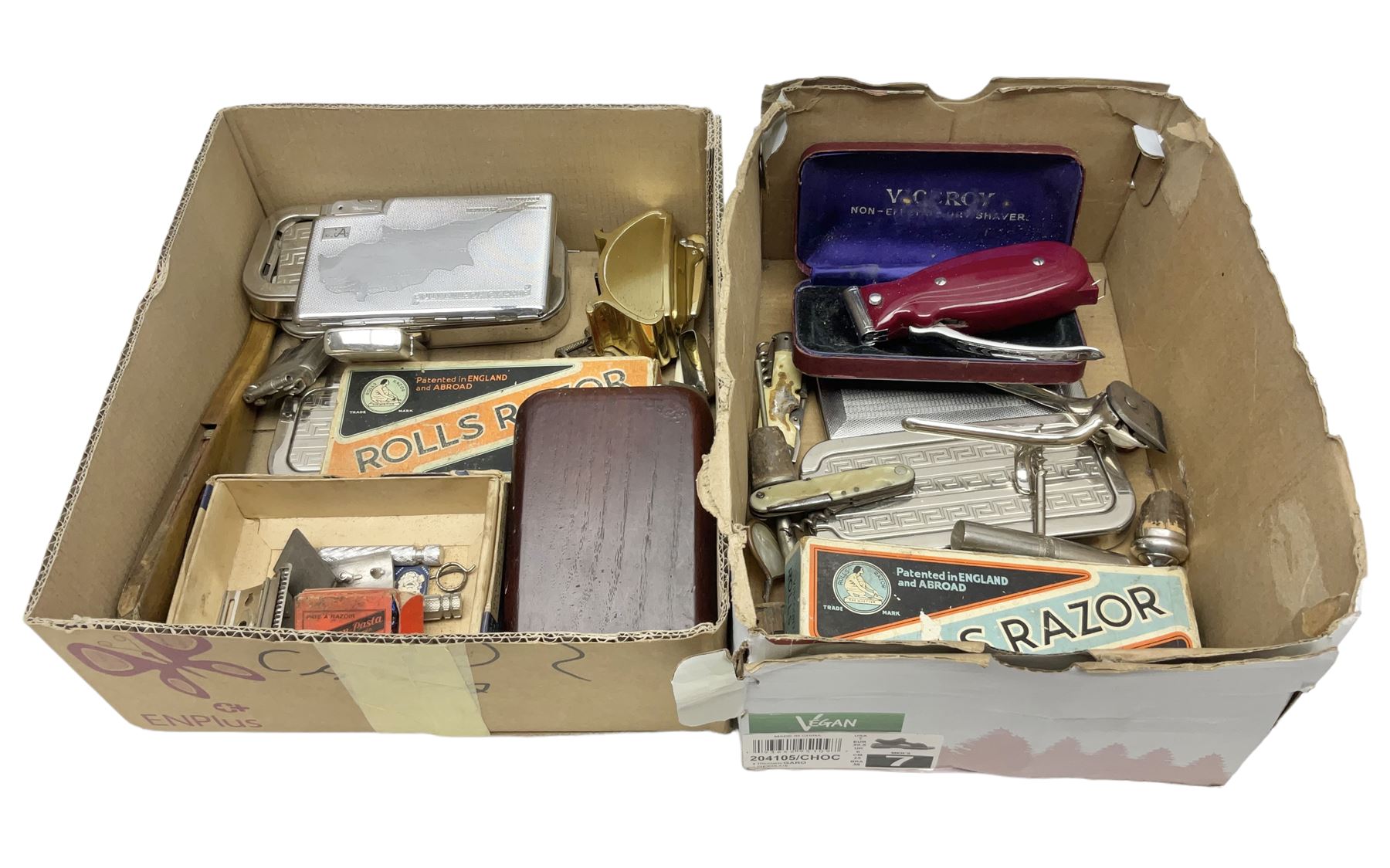 Collection of various razors and smoking items to include Ronson brass table lighter, Rolls Razor, Seigneur case with lighter, etc