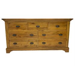 Light oak finish seven drawer chest