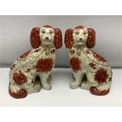 Two Pairs of Staffordshire style dogs, together with three other examples, largest example H27cm