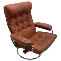 Mid-20th century Scandinavian easy chair, chromed metal frame upholstered in buttoned terracotta leather, swivel and reclining action (W84cm, H95cm); together with matching footstool (W55cm, H40cm)
