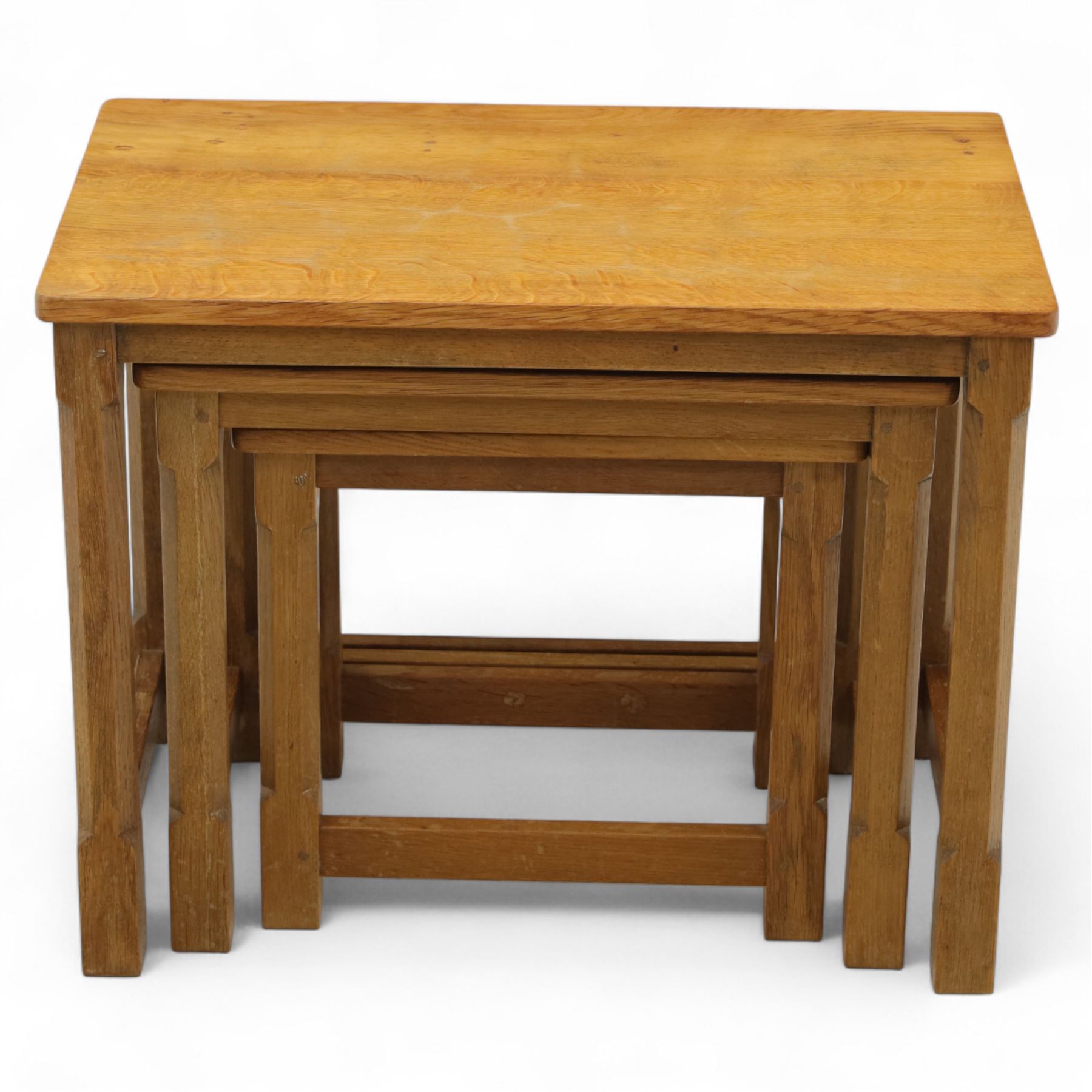 David 'Oakleafman' Langstaff - oak nest of three tables, each with a rectangular adzed top, with signature leaf motif on the bottom stretcher, from the workshop of David Langstaff, Easingwold, Yorkshire