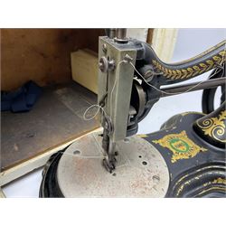 Jones hand sewing machine in case