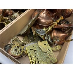 Quantity of copper pans and teapots, dish and sieve with pierced heart decoration and brass handle, together with quantity of brassware to include brass Art Nouveau crumb tray and brush, repousse chargers, fire tool accessories, decorative canon, sword and guns etc