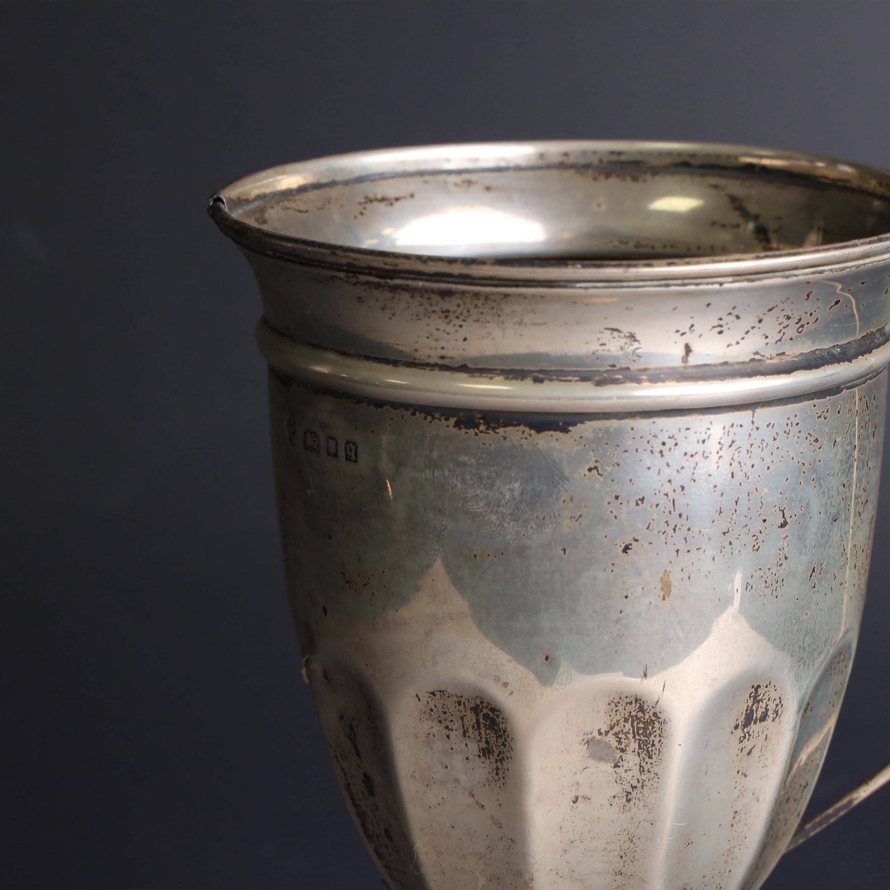 1930s silver trophy cup, of typical part fluted form with presentation engraving to body, with twin handles, one broken loose, hallmarked 	Charles Boyton & Son Ltd, London 1931, H21cm