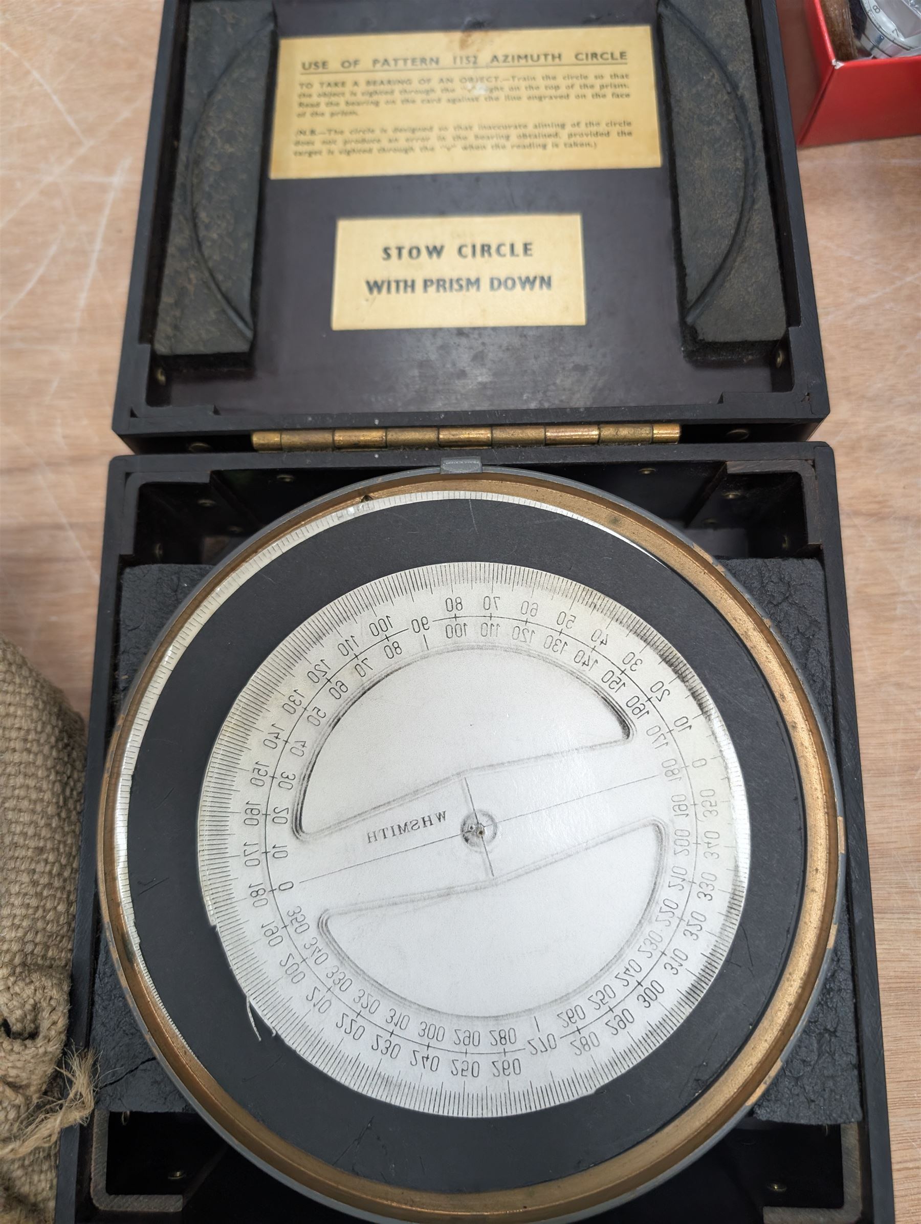 Azimuth Circle no. 1152, Sestrel Mark IIIA compass in wooden case and a field telephone