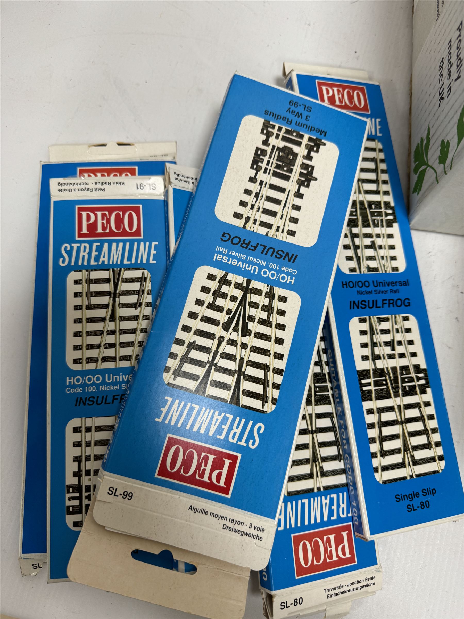 Collection of '00' gauge model railway accessories, including Peco Streamline and Insulfrog track, Metcalfe Platform kit, kit built model railway buildings and other accessories