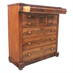 Victorian Scottish mahogany chest, cushion drawer over assorted small drawers and three long drawers, all with flame veneered fronts, turned wooden handles