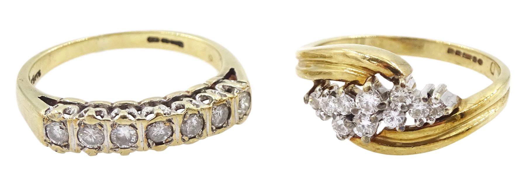 Gold seven stone round brilliant cut diamond ring, total diamond weight 0.25 carat and a gold diamond cluster ring, both hallmarked 9ct
