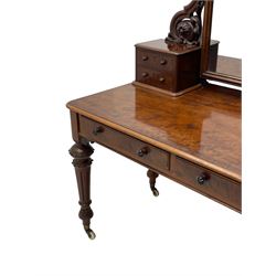 Victorian figured mahogany two-piece bedroom set - the washstand with white and black marble moulded top with arched back and raised shelf, two moulded frieze drawers, on turned and fluted supports with brass and ceramic castors (W123cm, D60cm, H102cm); the dressing table with raised swing mirror in moulded frame with shell and scroll carved pediment, on scrolled horns carved with foliage, four raised trinket drawers over moulded rectangular top, fitted with two drawers, on turned and fluted supports with brass and ceramic castors (W122cm, H177cm, D62cm)