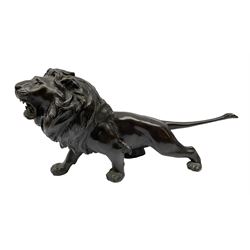 Japanese Meiji bronze model of a Lion, unsigned, L32cm 