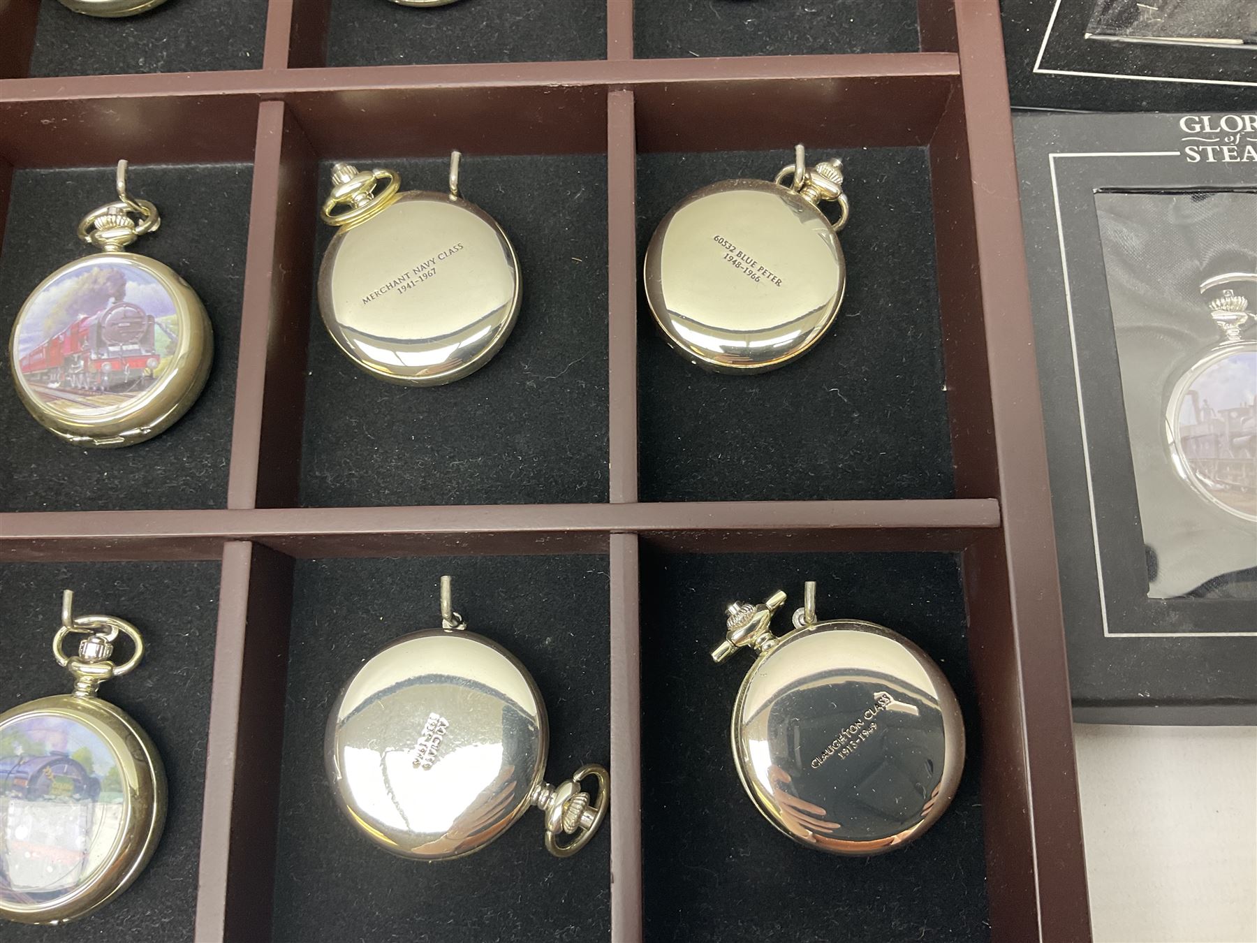 Twenty-three Glory of Steam Atlas Editions silver plated pocket watches, to include The Scottish Horse, Merchant Navy Class, etc, with wood display case, all boxed, twenty one with certificates