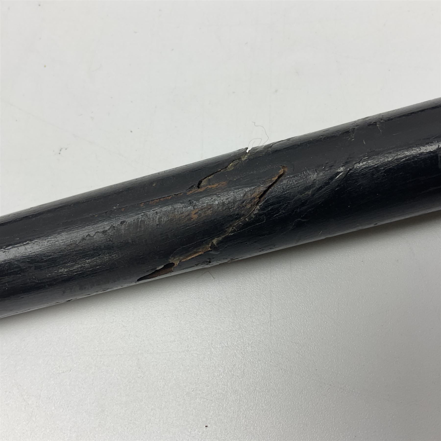Early 20th century Indian ebonised wooden umbrella sword stick with 36cm blade, carved bone mount and black cloth cover L92cm overall; together with a similar Indian ebonised wooden sword stick with 64cm blade, carved bone mount and brass lion mask pommel L91cm (2)