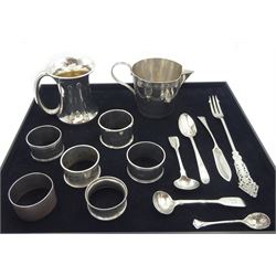 Edwardian silver christening mug by George Nathan & Ridley Hayes, Chester 1909, two silver mustard spoons markers mark P.W, Dublin 1846, six silver napkin rings, silver pierced and engraved picking fork and other flatware, all hallmarked, approx 13.8oz