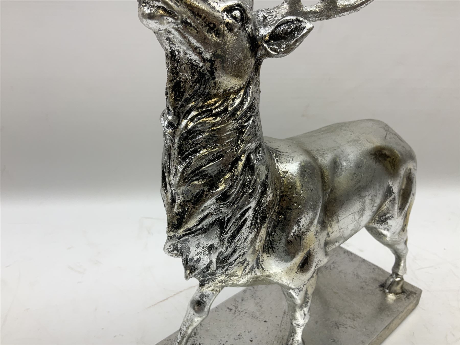 Composite silvered stag, on rectangular base