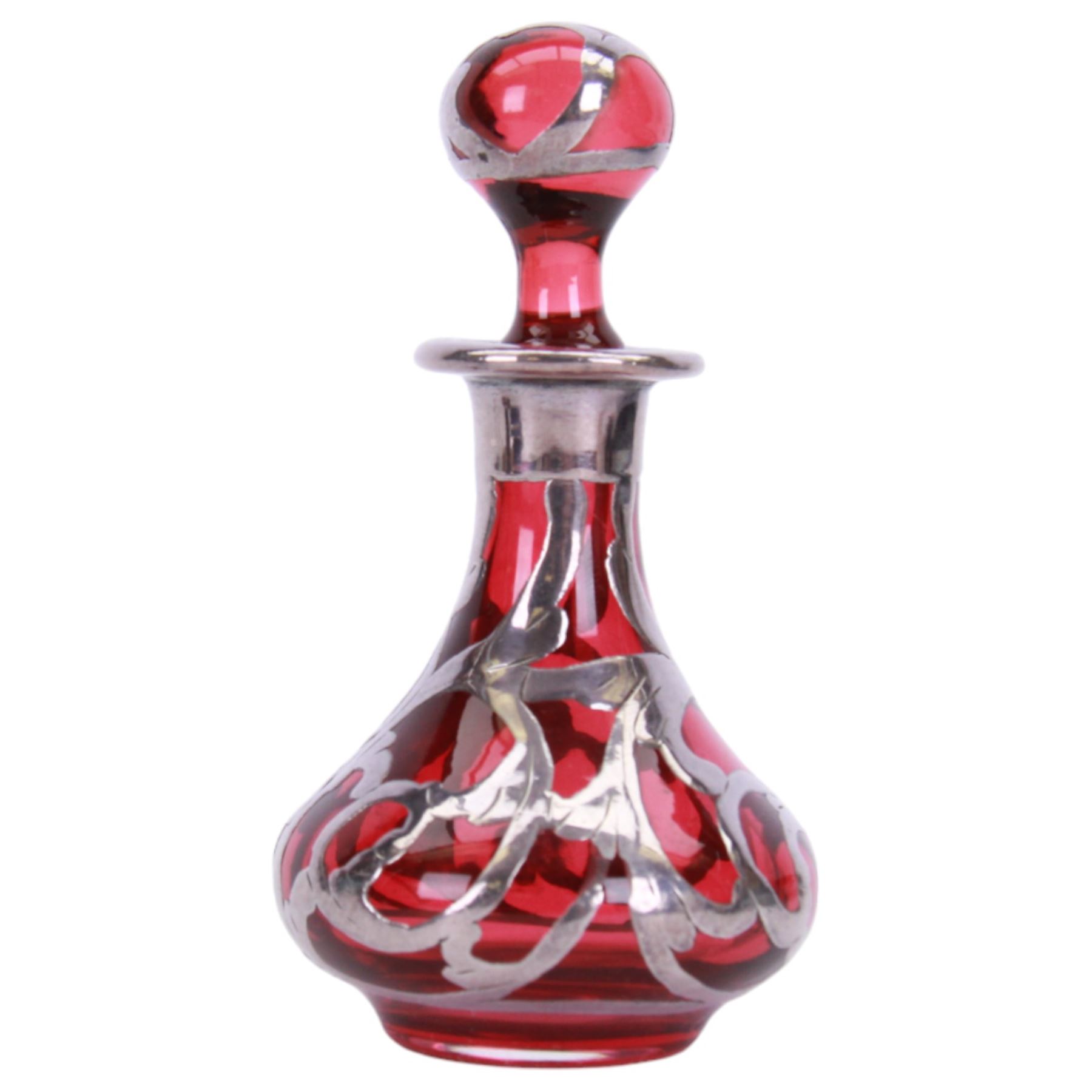 Cranberry glass scent bottle with silver overlay, together with German fluted vase with silver overlay upon a blue ground and similar teacup