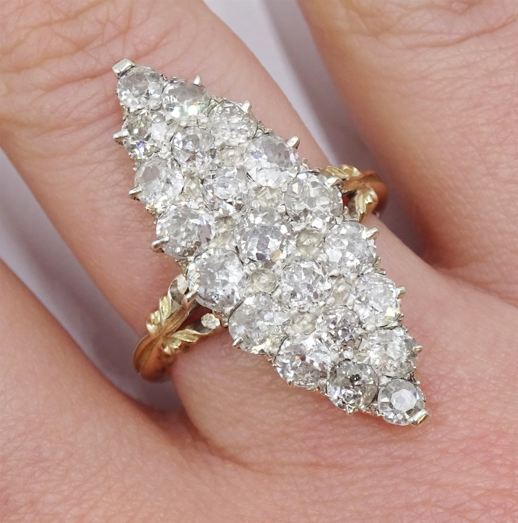 Victorian rose gold and silver, diamond marquise shaped ring, total diamond weight approx 1.70 carat
