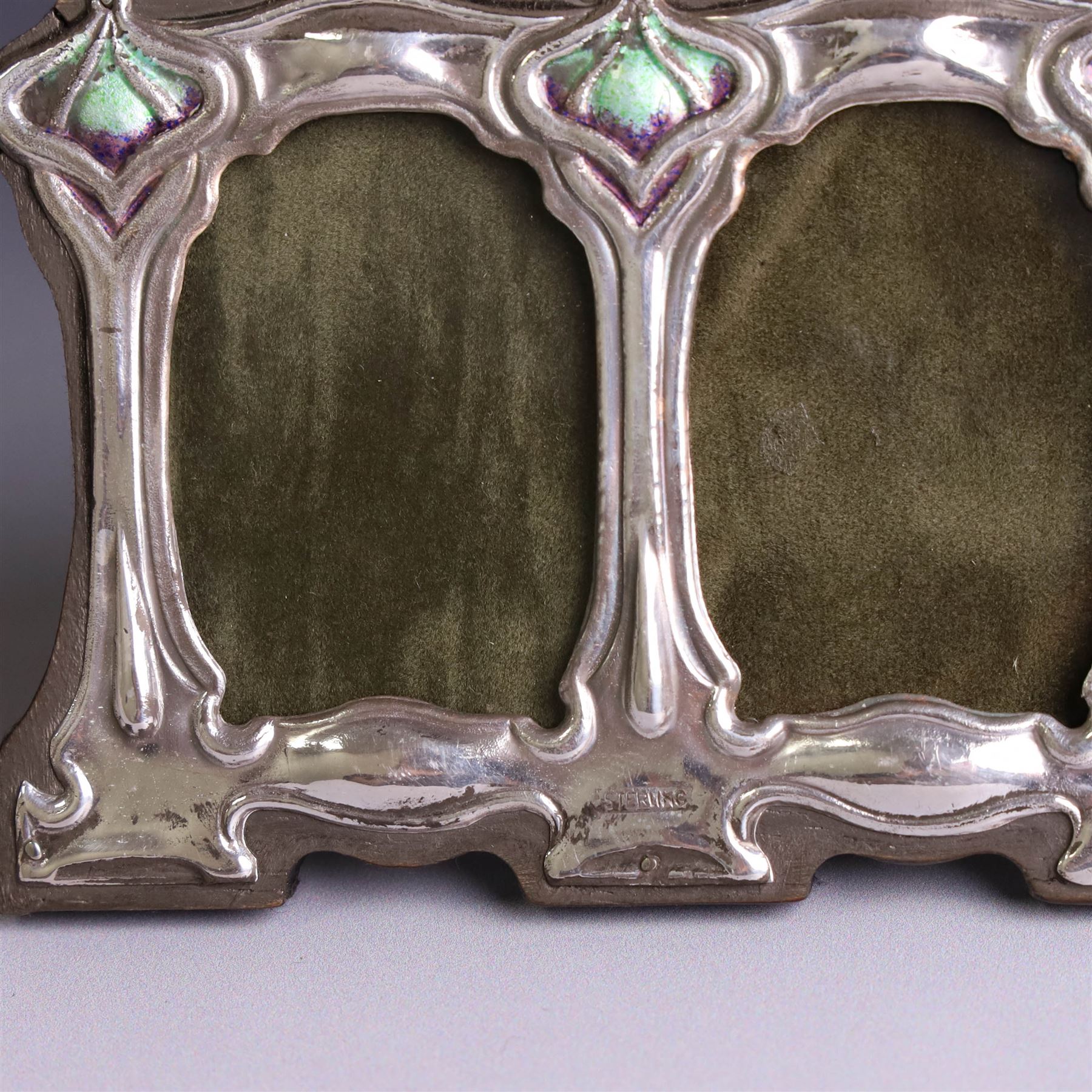 Silver mounted Art Nouveau style double photograph frame, with enamel decoration and wooden easel stand verso, stamped Sterling H8cm, W11cm,