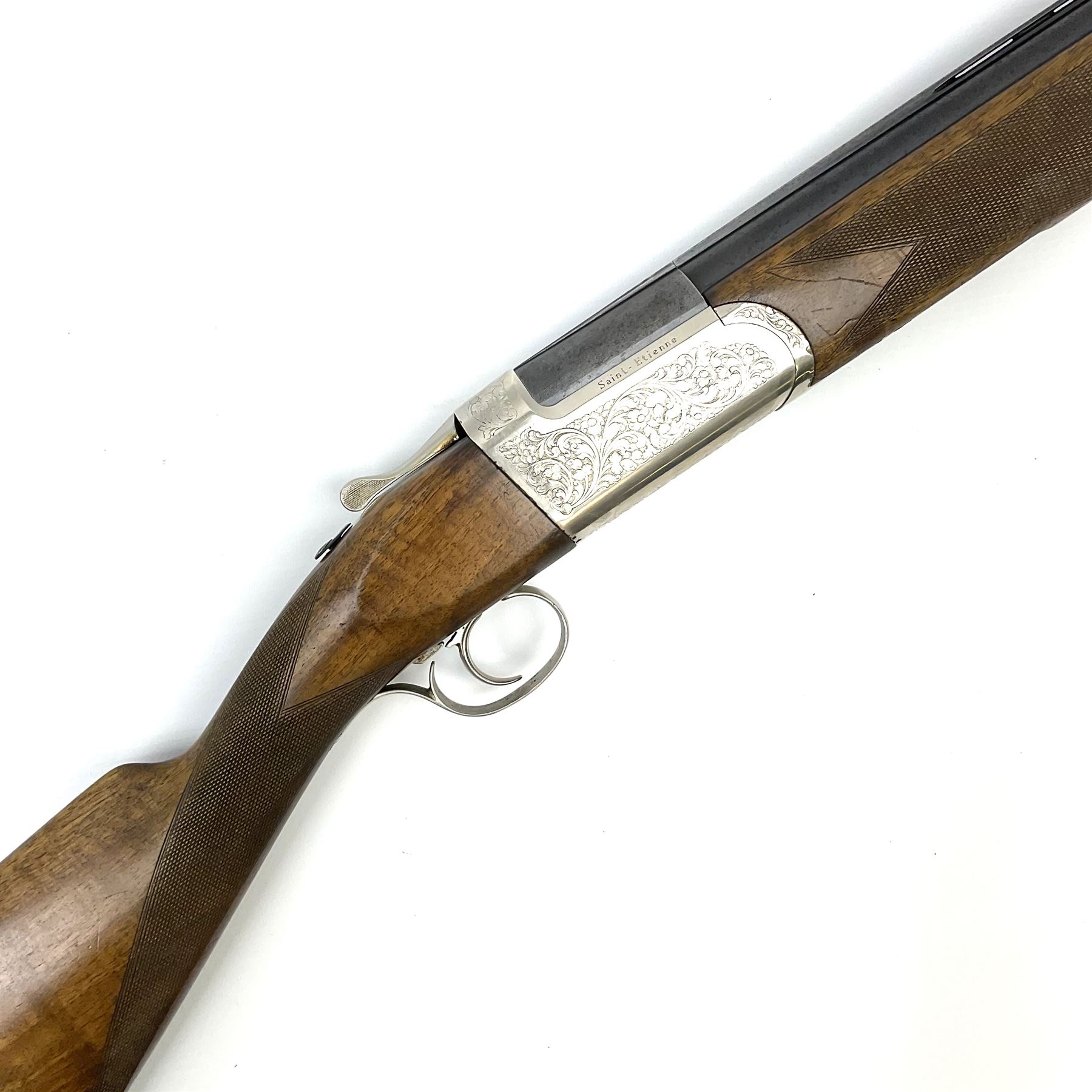 French Verney Carron 12-bore over-and-under double barrel boxlock ejector sporting gun, 71cm barrels, walnut stock with chequered grip and fore-end and thumb safety, serial no.336224X, L115cm RFD ONLY AS BARRELS MARGINALLY IN PROOF