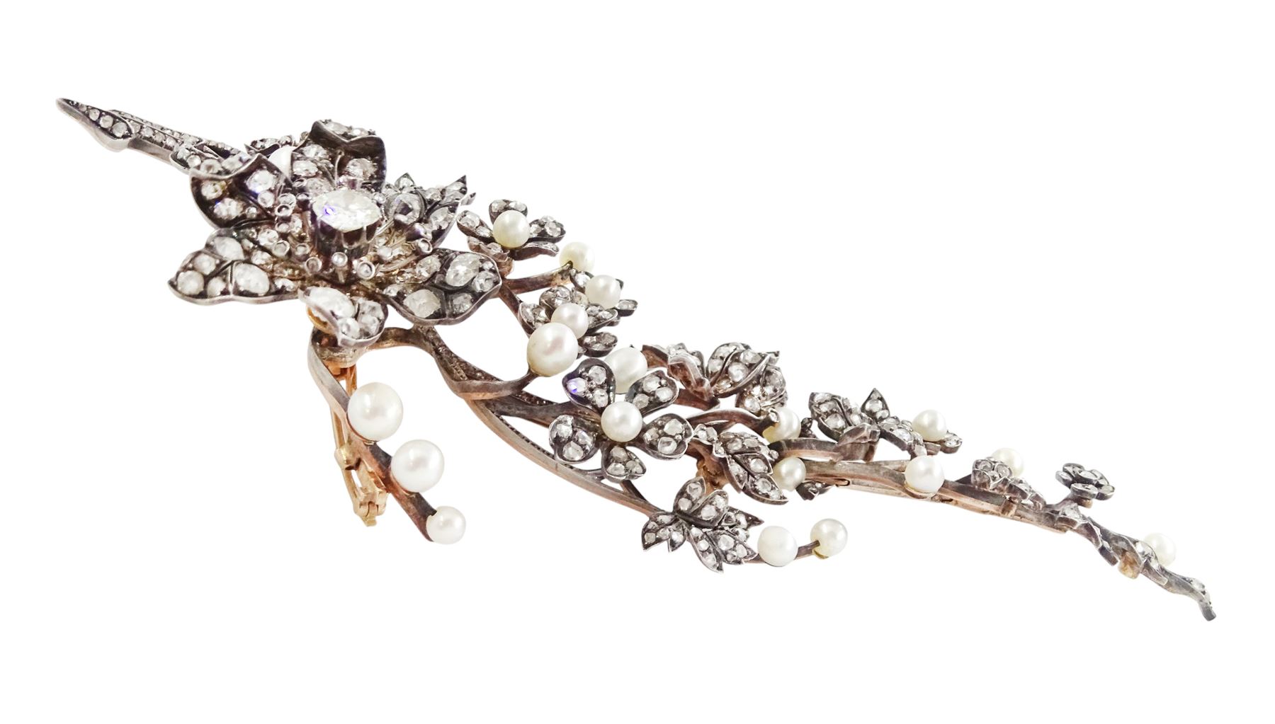 19th century gold and silver diamond and pearl en tremblant detachable brooch, the flower tremblant with a principal old cut diamond of approx 1.90 carat, the petals and stamen set with old cut and rose cut diamonds, total diamond weight approx 9.10 carat, to a foliate spray set set with further rose cut diamond and white / pink / cream pearls and ribbon tie